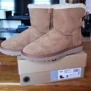 Chestnut fur ugg boots with mini bailey bow